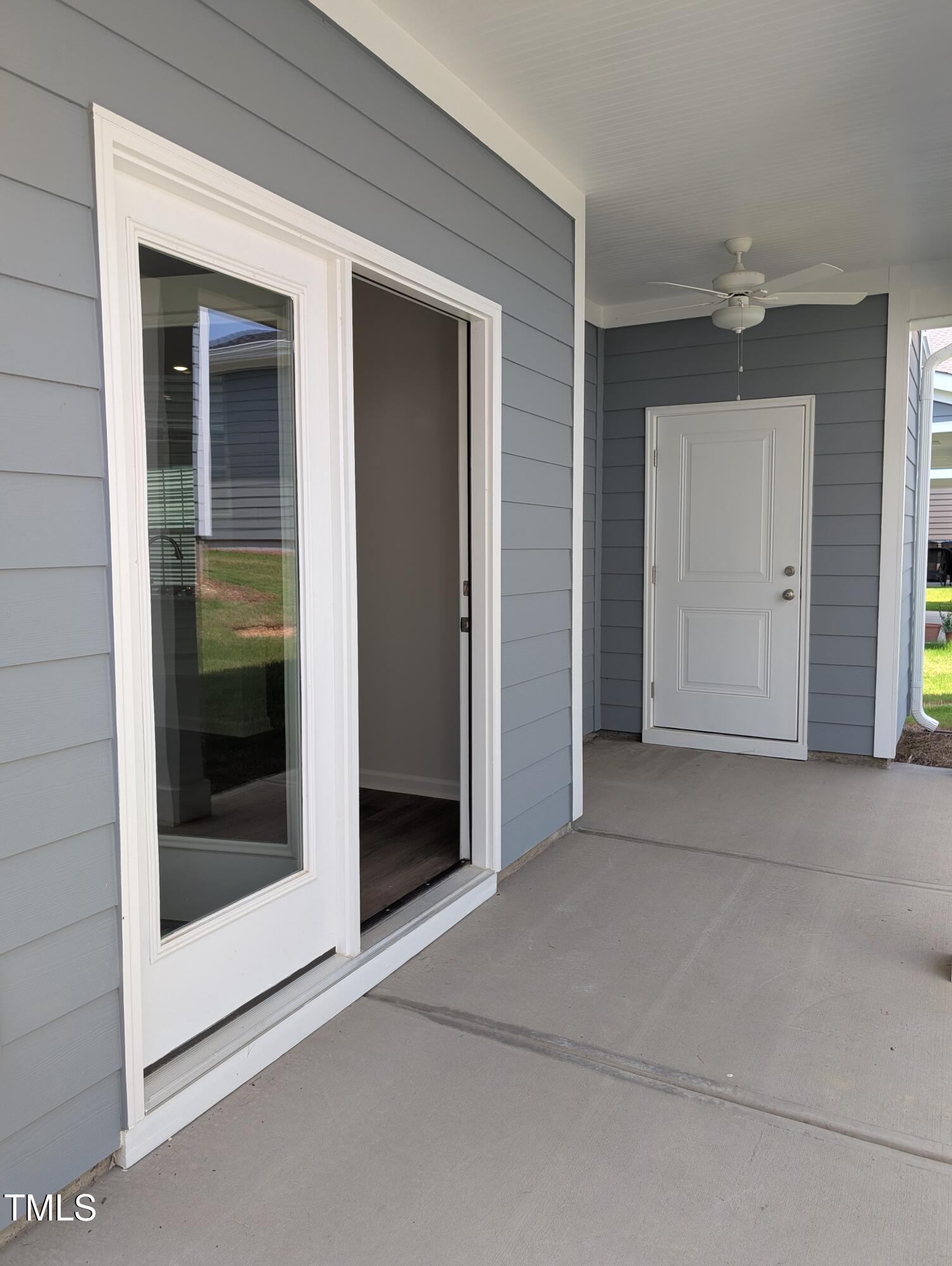 9224 Leaning Post Road, Unit 445 Wake Forest, NC 27587 - Photo 13 of 28 Rear Covered Porch wCeiling Fan and Stor