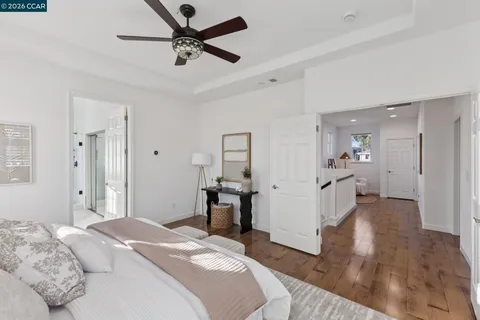 a bathroom with a sink a vanity and a bathtub