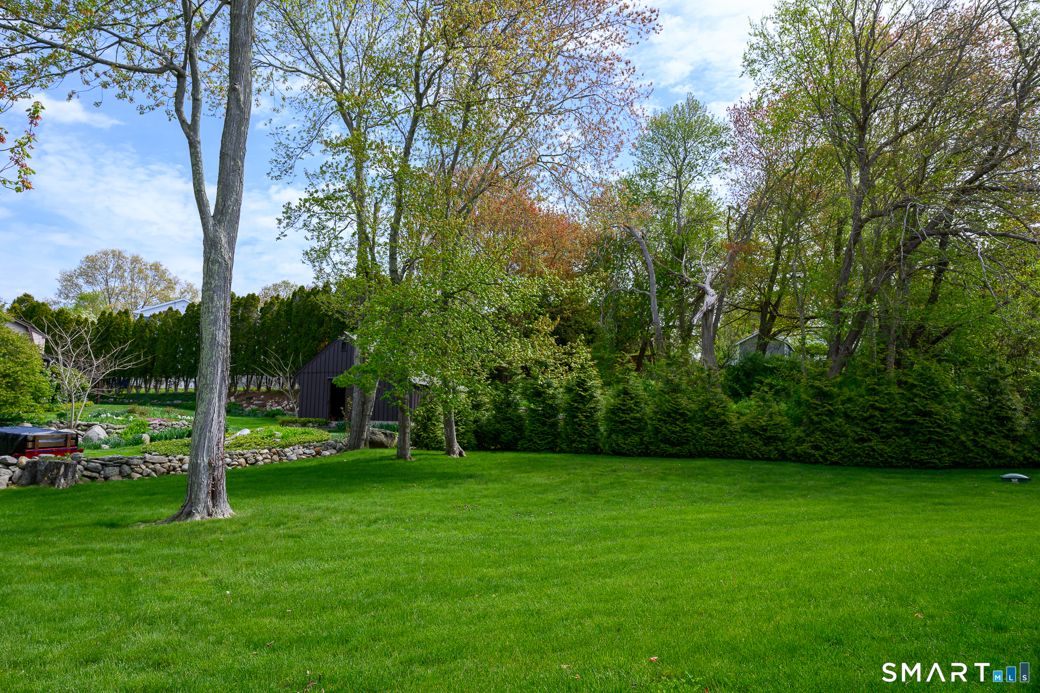 8 East Wharf Road Waterford, CT 06385 - Photo 30 of 40 a view of green field with trees