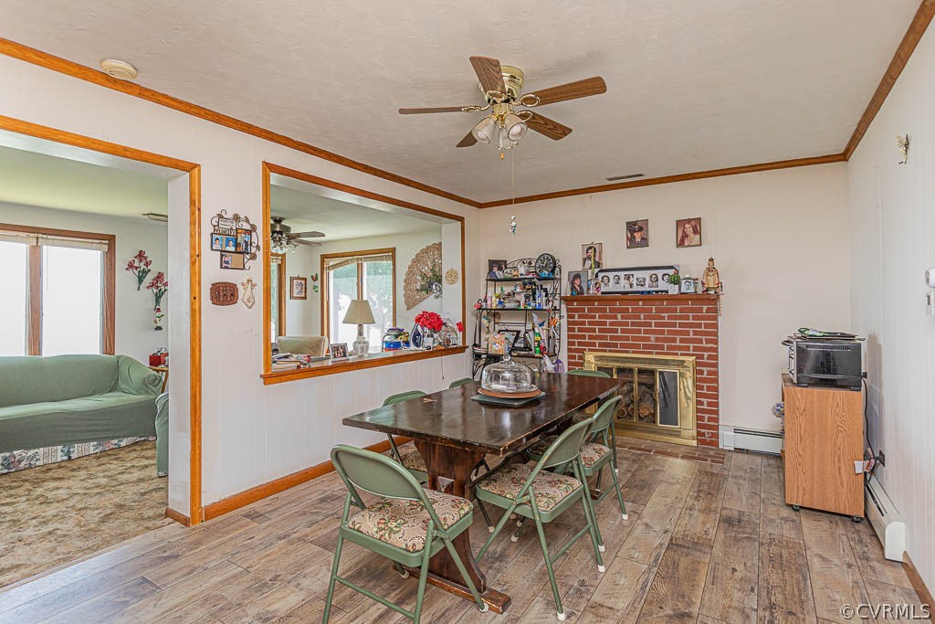 483 Riverside Drive Center Cross, VA 22437 - Photo 12 of 50 Eat-in area of the kitchen - Wood burning fireplac