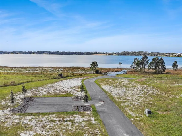 a view of an ocean and city