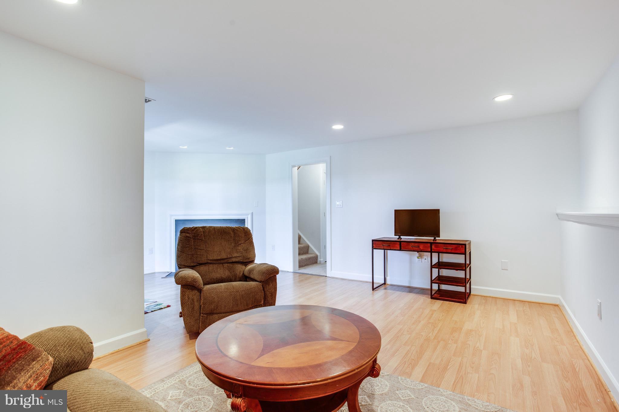 5599 Rivendell Place Frederick, MD 21703 - Photo 16 of 28 Basement Rec Area