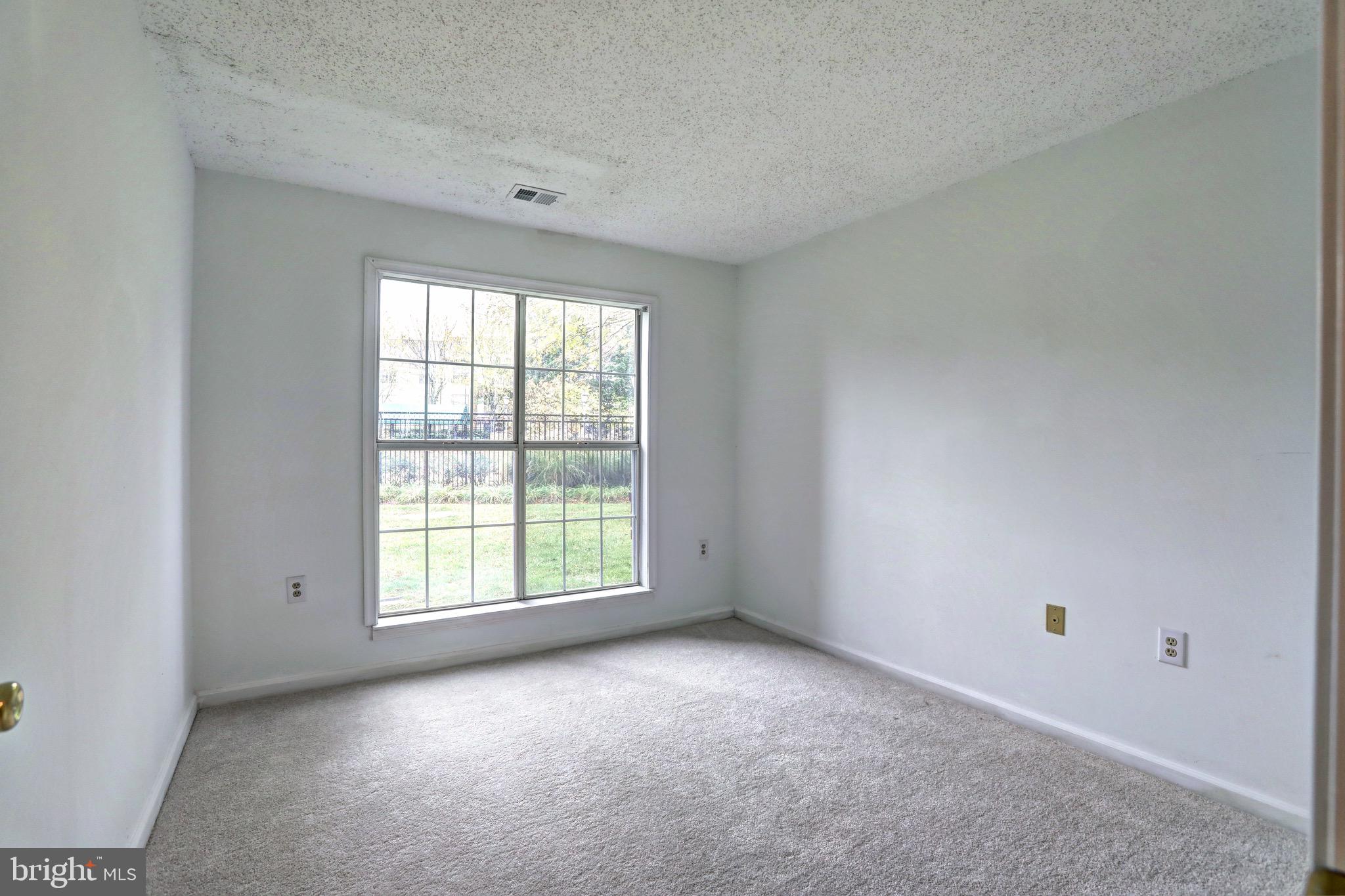 20957 Timber Ridge Terrace, Unit 104 Ashburn, VA 20147 - Photo 11 of 21 2nd Bedroom