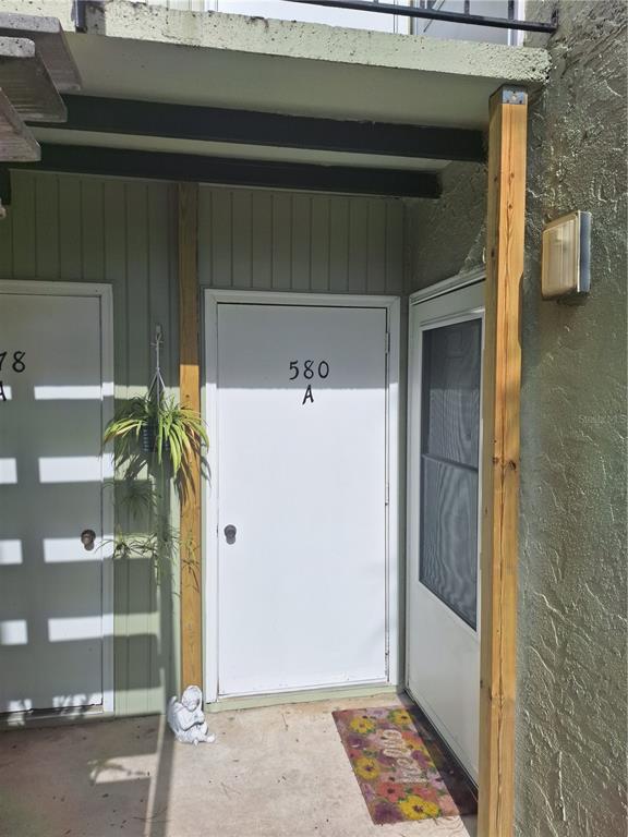 580 Fairways Circle, Unit A Ocala, FL 34472 - Photo 2 of 15 a bathroom with a shower and a sink