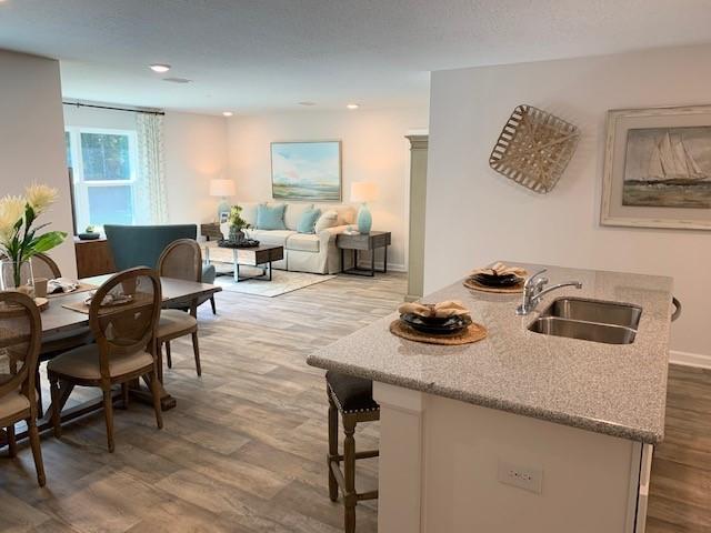 1009 Limpkin Street Crestview, FL 32539 - Photo 5 of 21 a living room with furniture and a table