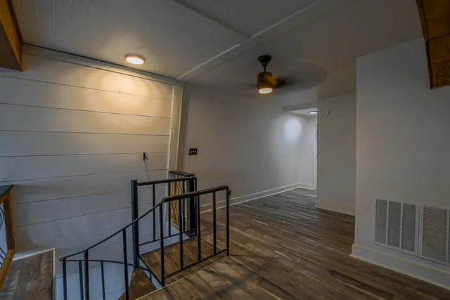 a view of entryway with wooden floor