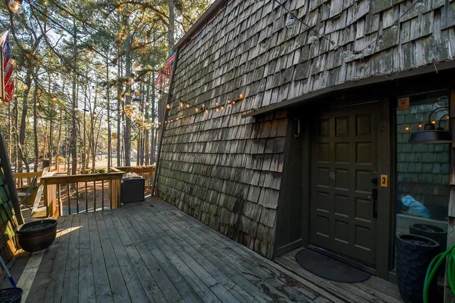a view of outdoor space and wooden deck