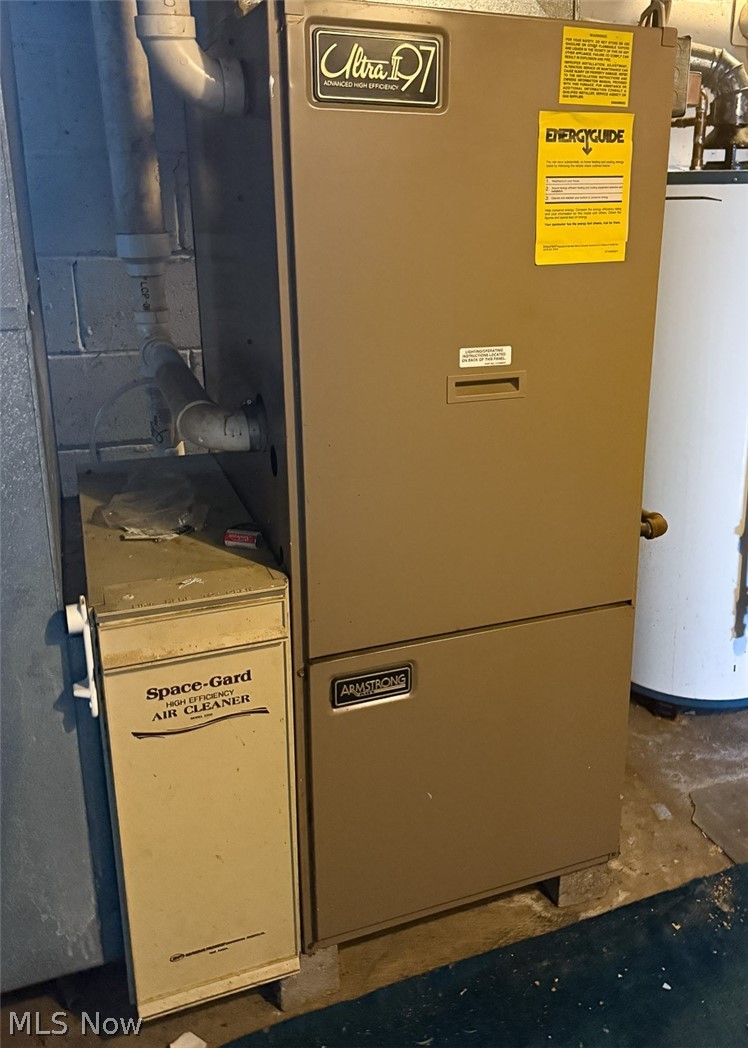 3336 Broad Run Dairy Road Northwest Dover, OH 44622 - Photo 23 of 26 Utilities with water heater and heating unit