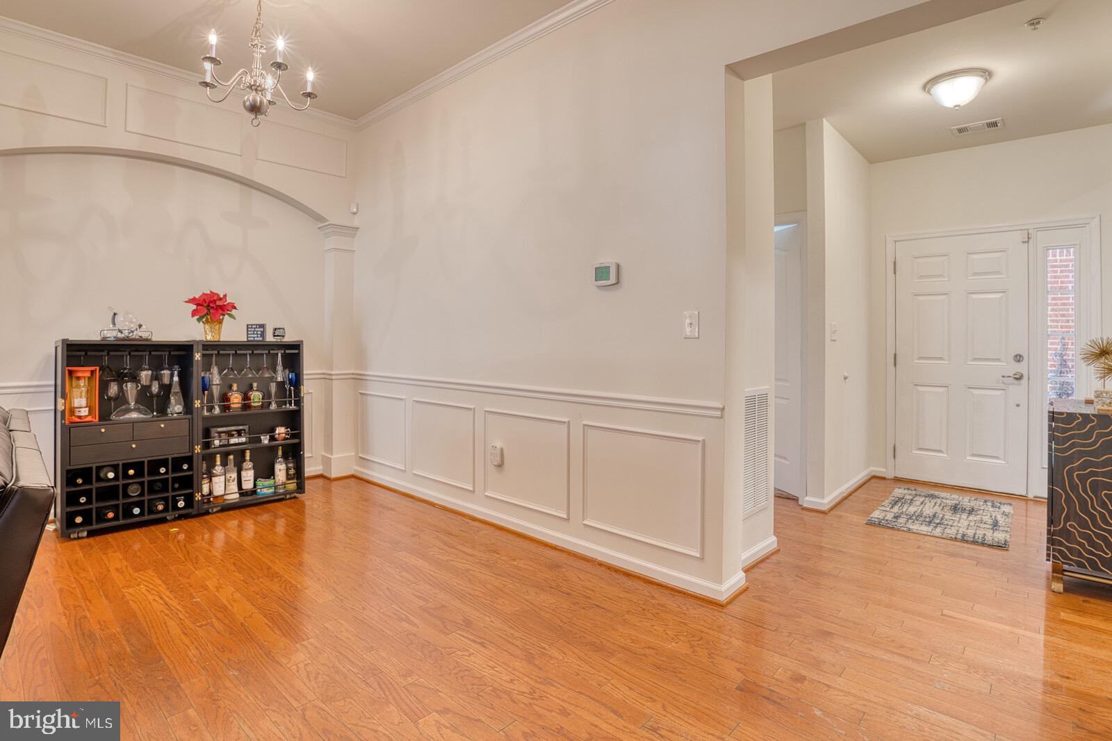 WELL APPOINTED DR WITH WAINSCOTING THROUGHOUT