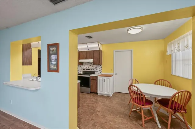 a room with furniture and a chair