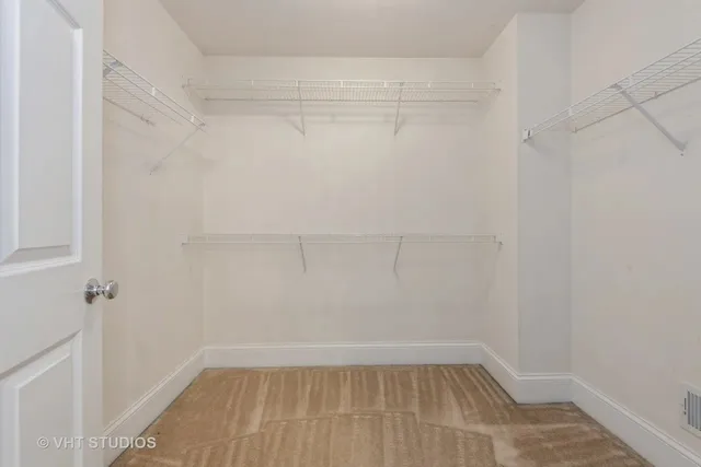 a view of a room with racks on the wall