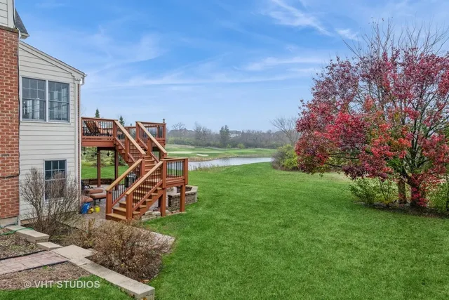 a view of a house with a back yard