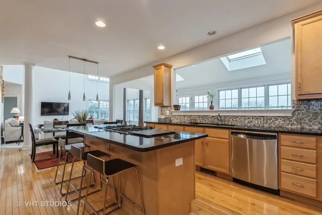 a kitchen with granite countertop a sink and counter space