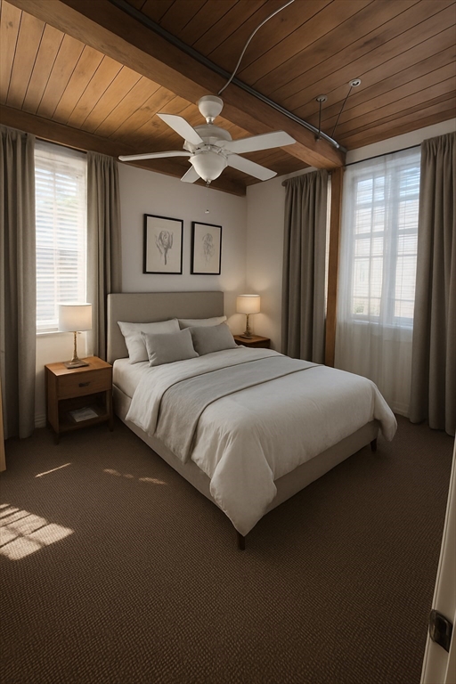 7 Marble Street, Unit 206E Whitman, MA 02382 - Photo 6 of 6 a bedroom with a large bed and a chandelier