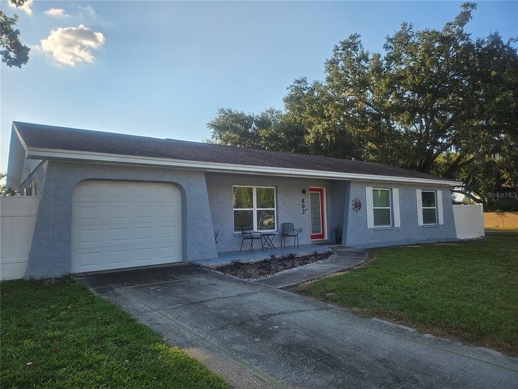 802 Windsor Circle Brandon, FL 33510 - Photo 4 of 17 front view of a house with a yard