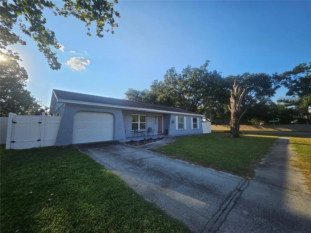 802 Windsor Circle Brandon, FL 33510 - Photo 5 of 17 a front view of a house with garden