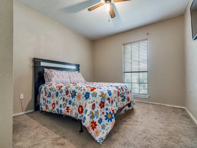 a bathroom with a sink double vanity and a mirror