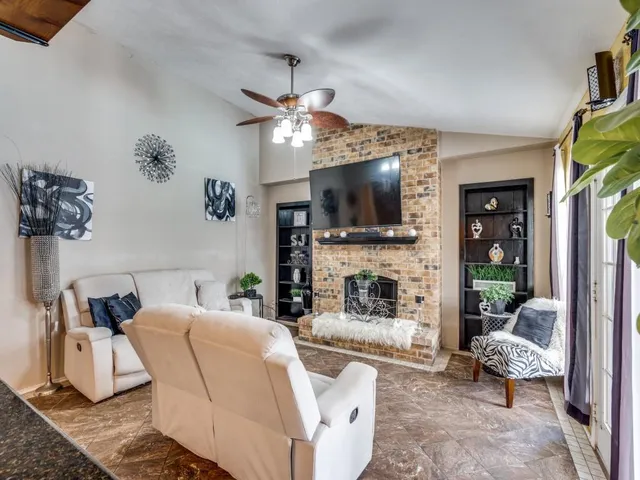 a kitchen with kitchen island granite countertop a table and chairs