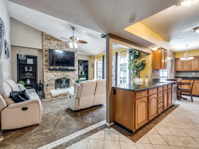 an outdoor space with swimming pool and slide