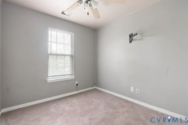 a view of an empty walk in closet