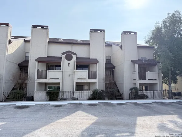 a front view of multi story residential apartment building