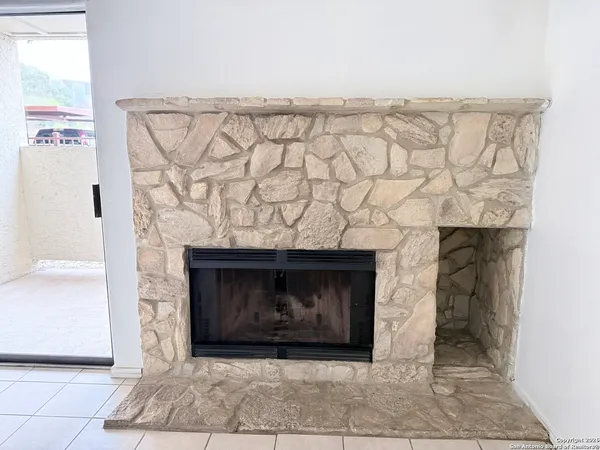 a fireplace with a clock on it