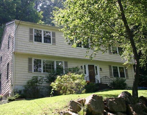 197 Old Sib Road Ridgefield, CT 06877 - Photo 1 of 1 a front view of a house with a yard