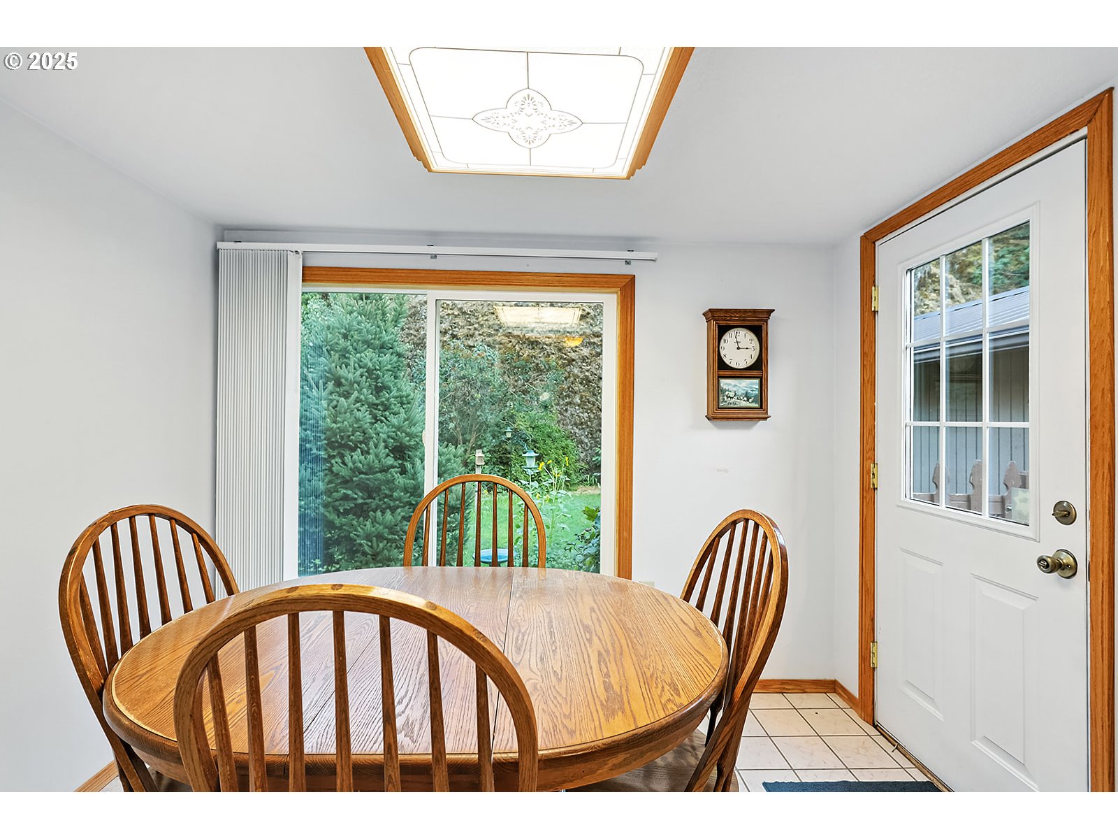 850 Highway 142 Lyle, WA 98635 - Photo 11 of 39 a view of a big room with wooden floor and windows