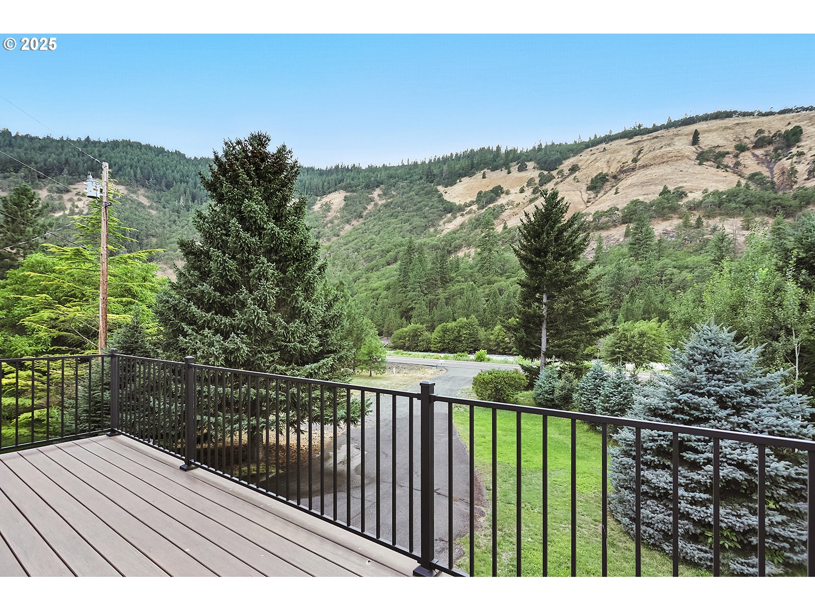 850 Highway 142 Lyle, WA 98635 - Photo 22 of 39 a view of balcony with wooden floor and fence
