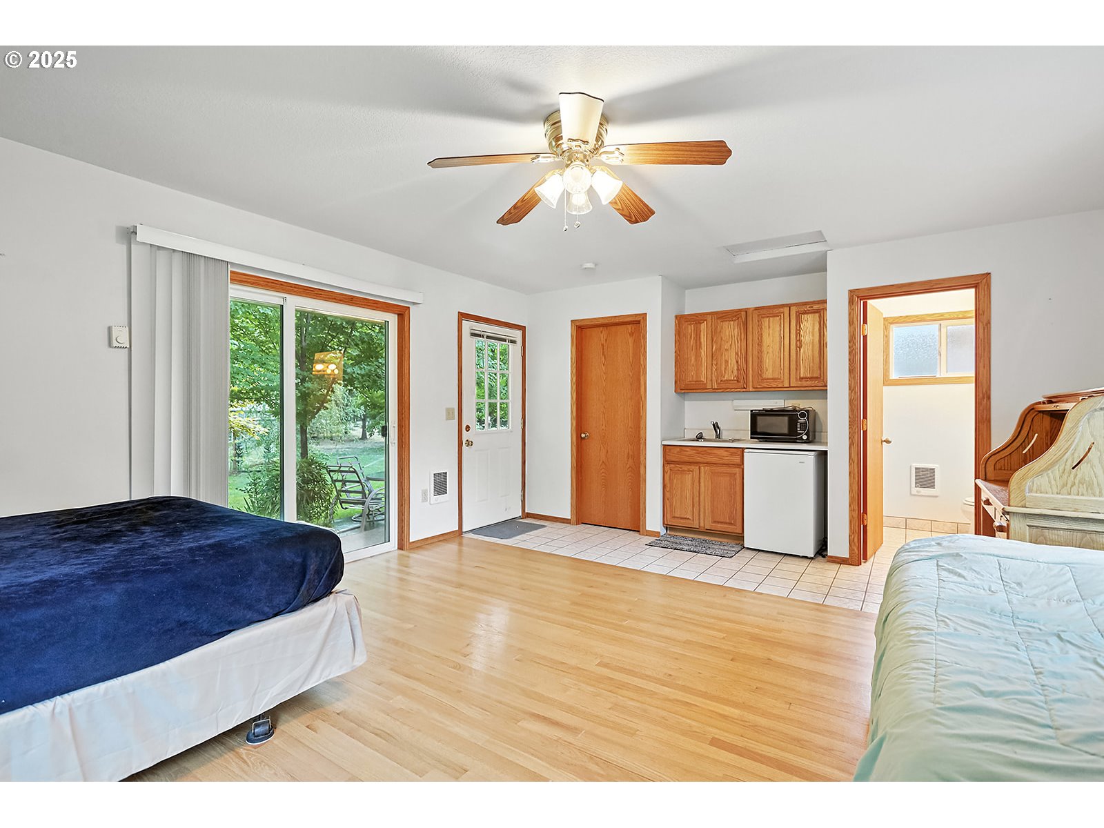 850 Highway 142 Lyle, WA 98635 - Photo 29 of 39 a living room with stainless steel appliances kitchen island granite countertop furniture and a large window