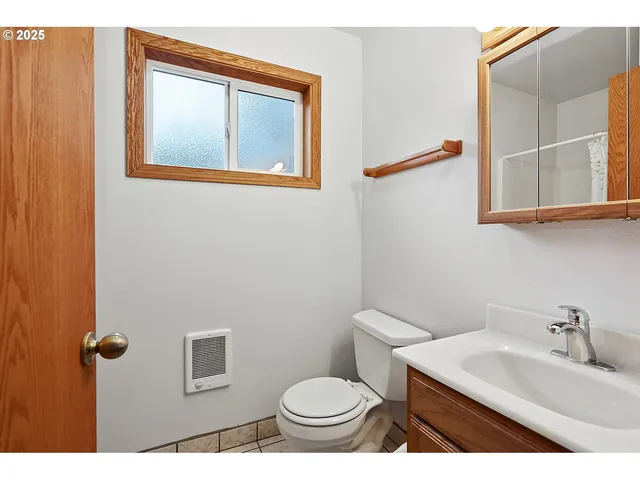 a house with trees in the background