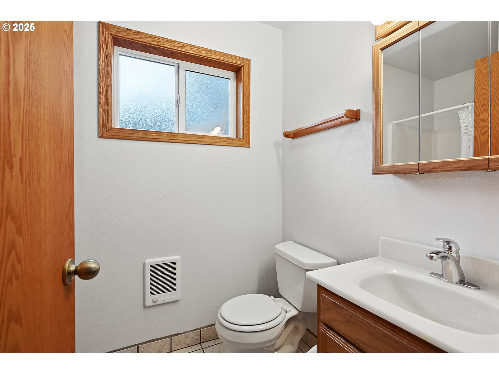 850 Highway 142 Lyle, WA 98635 - Photo 30 of 39 a bathroom with a toilet a sink and mirror