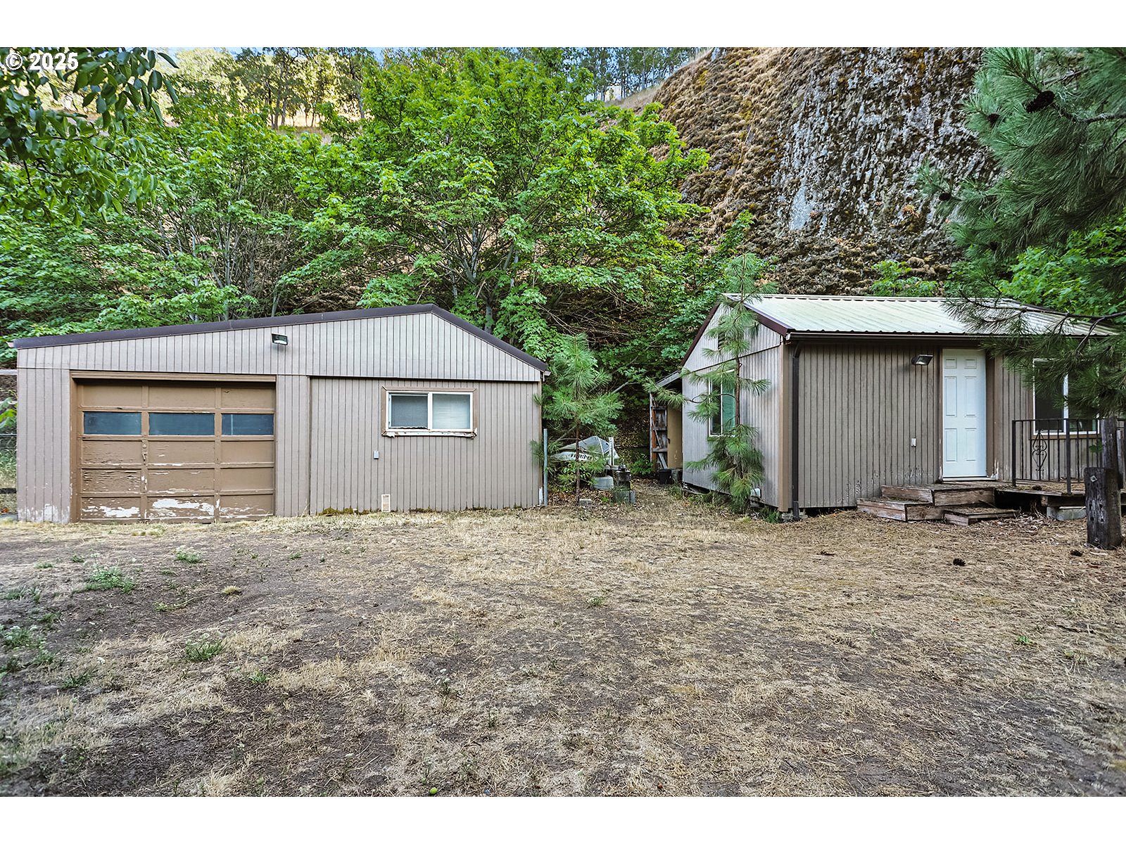 850 Highway 142 Lyle, WA 98635 - Photo 31 of 39 a house with trees in the background