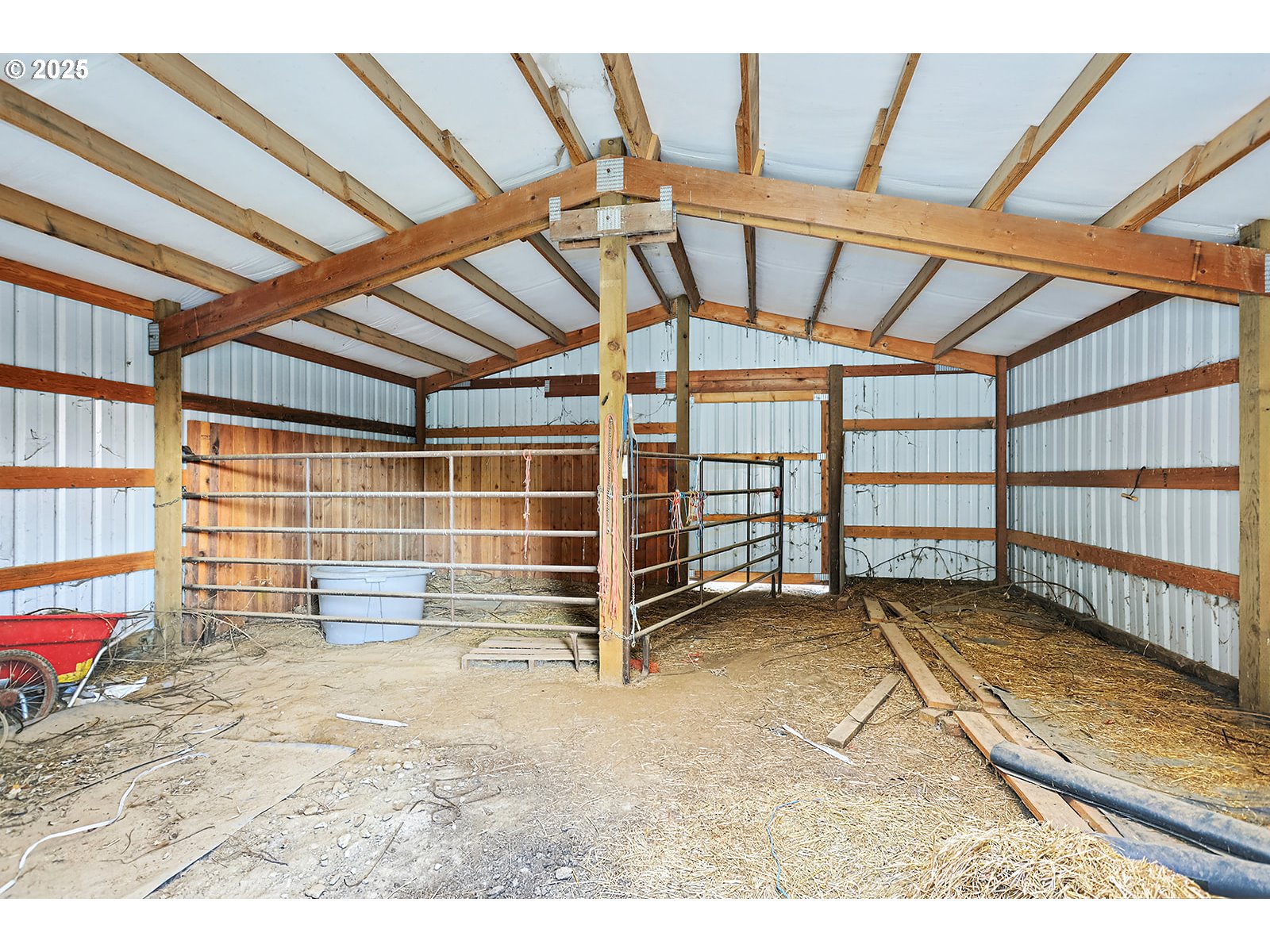 850 Highway 142 Lyle, WA 98635 - Photo 32 of 39 a view of an empty room with wooden floor and a window
