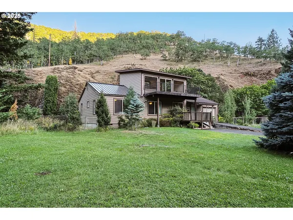 a view of a wooden floor with a bedroom