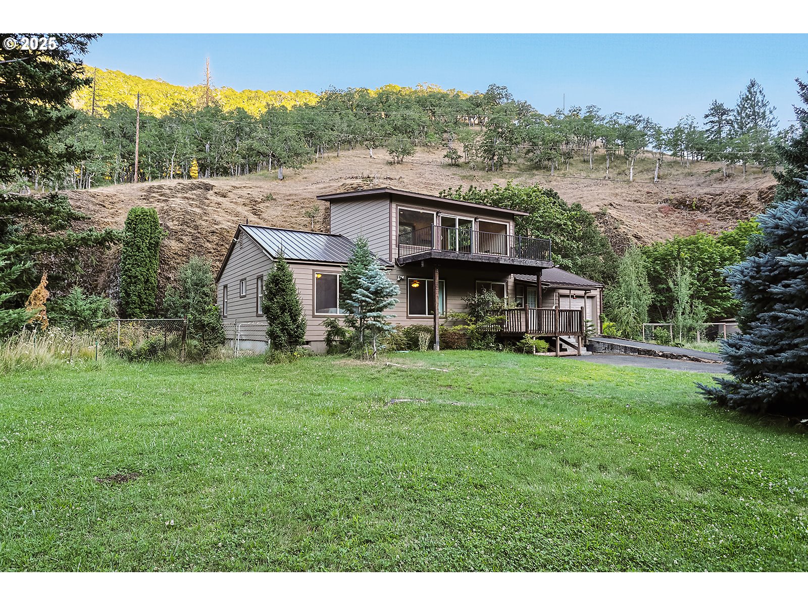 850 Highway 142 Lyle, WA 98635 - Photo 4 of 39 a view of a house with a big yard