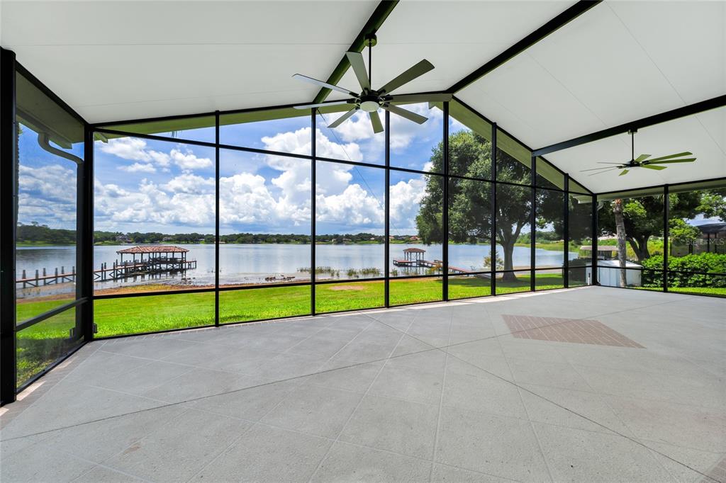1703 Roberts Landing Road Windermere, FL 34786 - Photo 23 of 61 a view of empty room with porch and patio