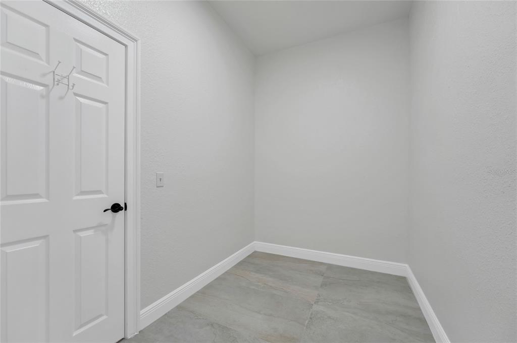 1703 Roberts Landing Road Windermere, FL 34786 - Photo 30 of 61 a room that has a window in it