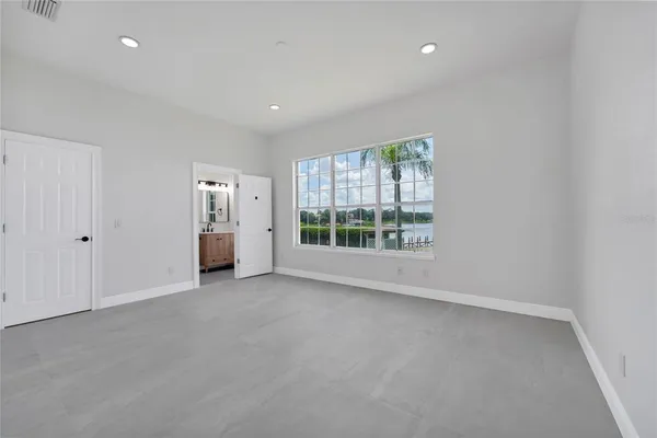 an empty room with windows