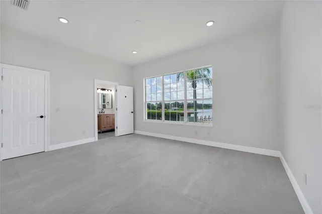 an empty room with windows