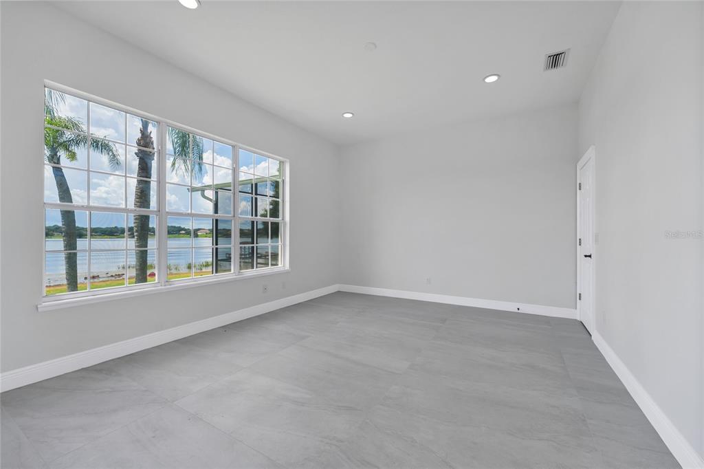 1703 Roberts Landing Road Windermere, FL 34786 - Photo 34 of 61 a view of an empty room with a window