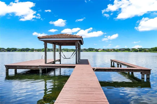 a view of a garden with a lake view