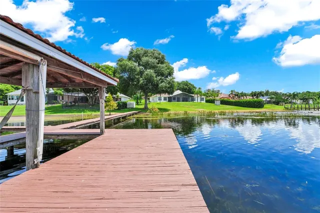 a view of outdoor space with garden and trees