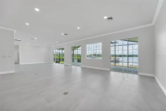 a view of an empty room with a sliding door