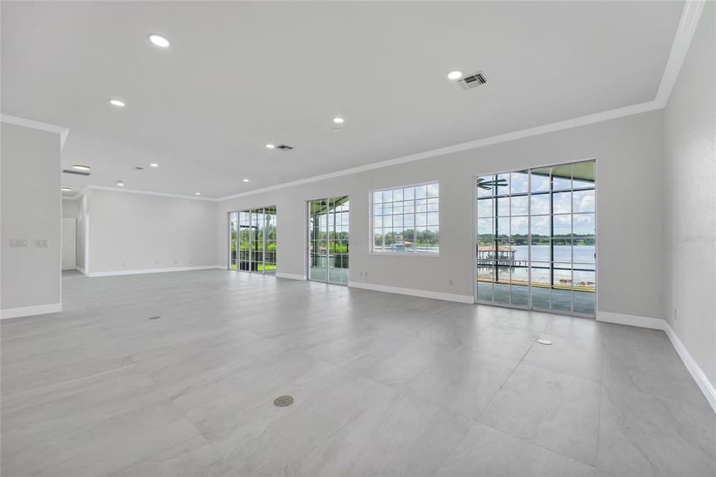 1703 Roberts Landing Road Windermere, FL 34786 - Photo 9 of 61 a view of an empty room with a window