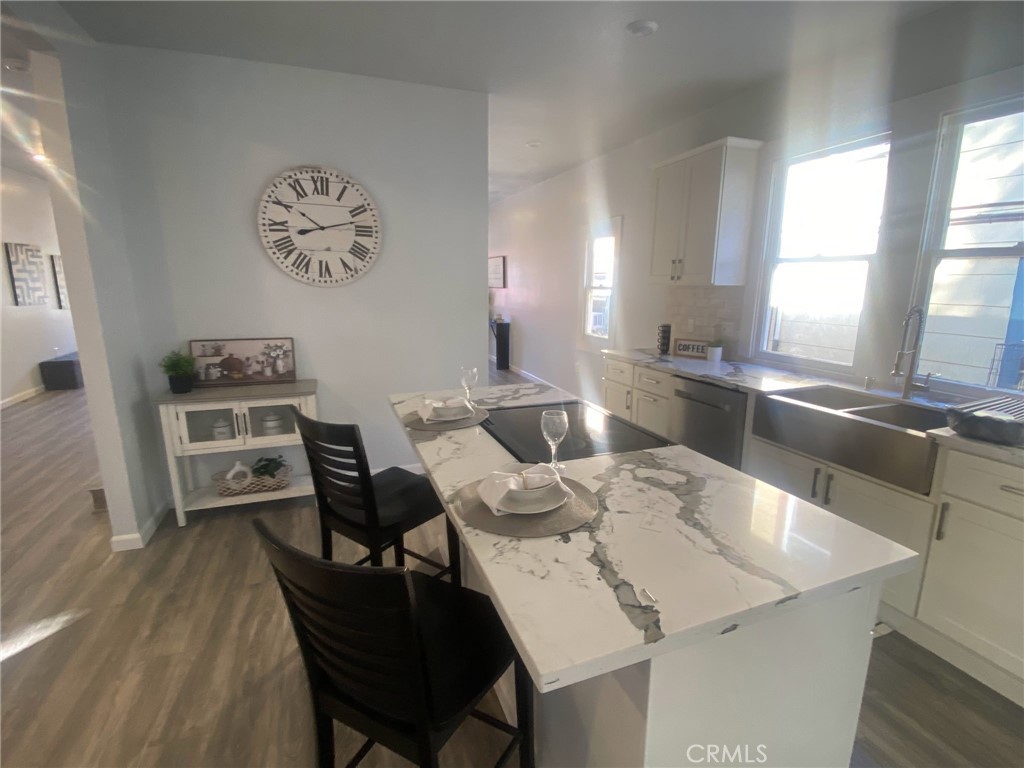 3520 Harrison Street Oakland, CA 94611 - Photo 1 of 24 a view of a dining room with furniture and wooden floor