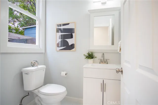 a kitchen with a stove and a refrigerator