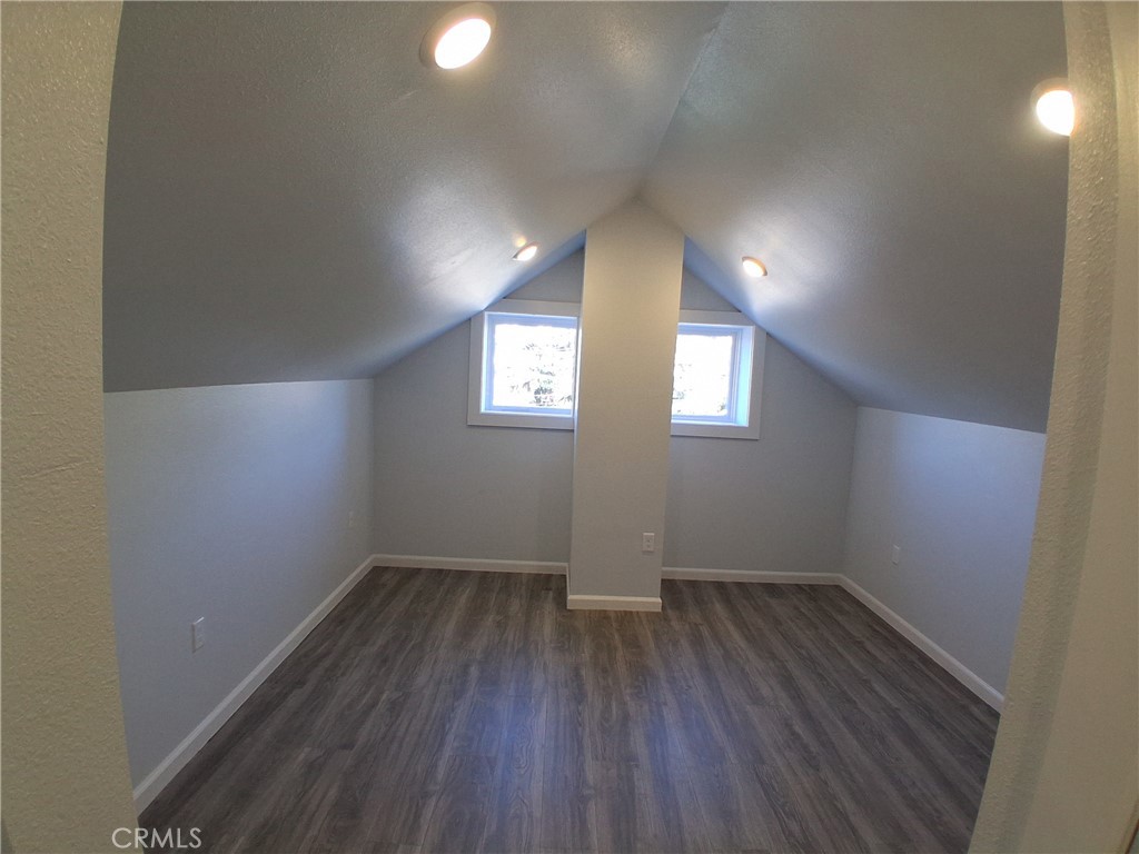 3520 Harrison Street Oakland, CA 94611 - Photo 15 of 24 an empty room with wooden floor and windows