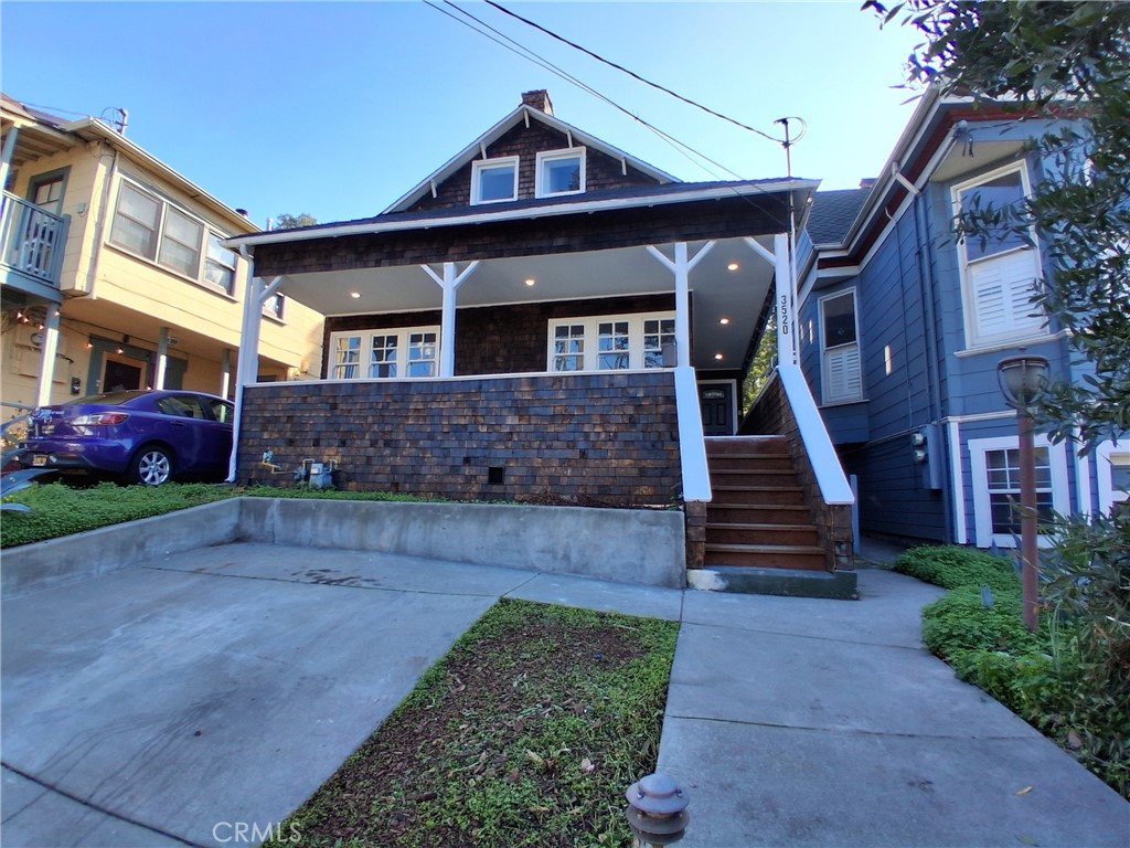 3520 Harrison Street Oakland, CA 94611 - Photo 24 of 24 a front view of a house with a garden