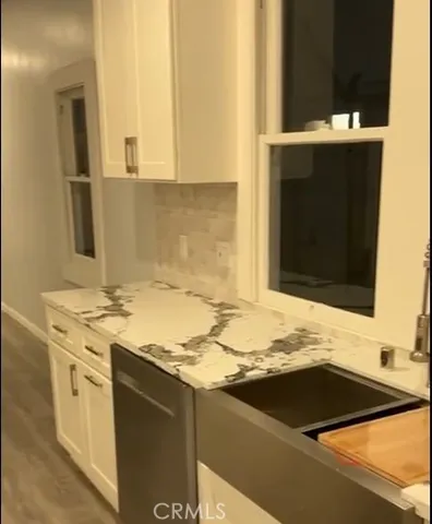 a bathroom with a sink and a stove